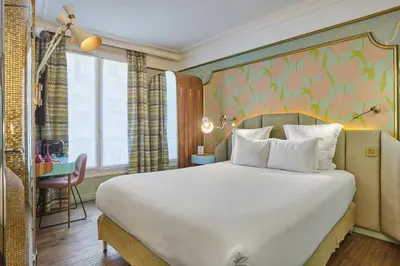 Un ou plusieurs lits dans un hébergement de l'établissement Idol Hotel
