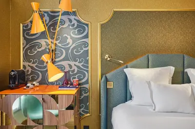 Un ou plusieurs lits dans un hébergement de l'établissement Idol Hotel