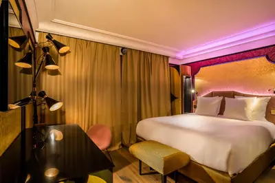 Un ou plusieurs lits dans un hébergement de l'établissement Idol Hotel