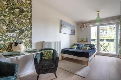 Coin salon dans l'établissement Joli appartement dans Eco quartier résidentiel