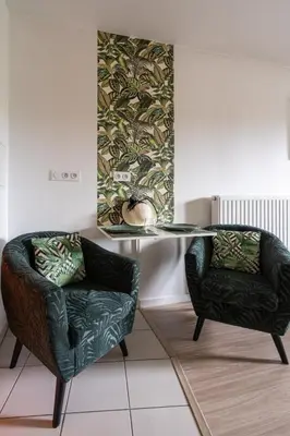 Coin salon dans l'établissement Joli appartement dans Eco quartier résidentiel