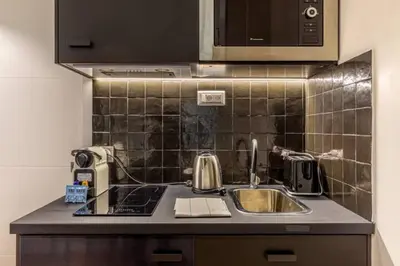 Cuisine ou kitchenette dans l'établissement Le Shade of Grey - Studio Cosy - by Mon Petit Faré
