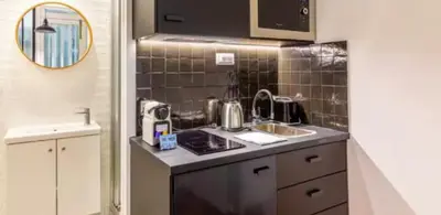 Cuisine ou kitchenette dans l'établissement Le Shade of Grey - Studio Cosy - by Mon Petit Faré