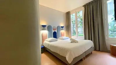 Un ou plusieurs lits dans un hébergement de l'établissement Le Majorelle - Calme & Cosy - by Mon Petit Faré