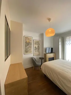 Un ou plusieurs lits dans un hébergement de l'établissement Maison Auguste