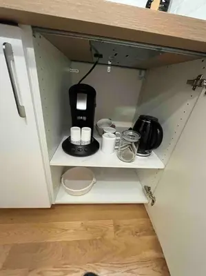 Cuisine ou kitchenette dans l'établissement Paris cocooning à 5 minutes de la Gare du Nord