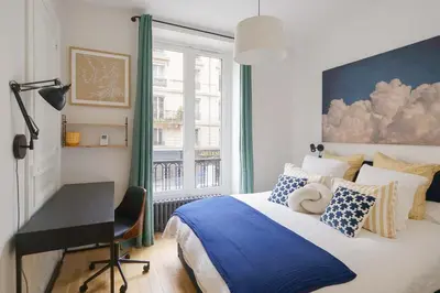 Un ou plusieurs lits dans un hébergement de l'établissement Magnifique appartement 135m2 Jardin du Luxembourg