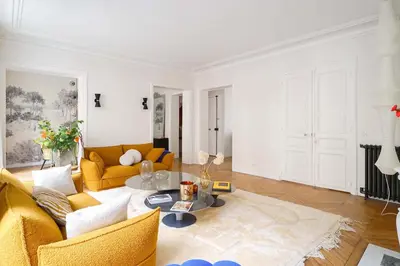 Coin salon dans l'établissement Magnifique appartement 135m2 Jardin du Luxembourg