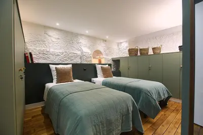 Un ou plusieurs lits dans un hébergement de l'établissement Boutik Boheme - Triplex Monceau