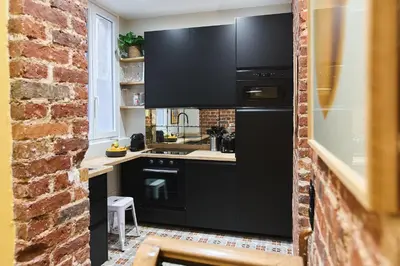 Cuisine ou kitchenette dans l'établissement Boutik Boheme - Triplex Monceau