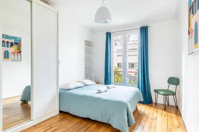 Un ou plusieurs lits dans un hébergement de l'établissement GuestReady - Douceur Parisienne dans le 15e arr.