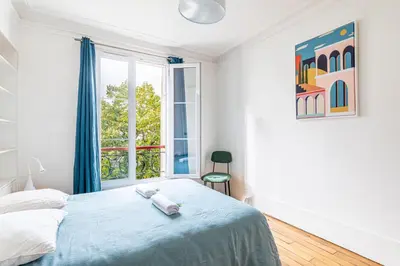 Un ou plusieurs lits dans un hébergement de l'établissement GuestReady - Douceur Parisienne dans le 15e arr.