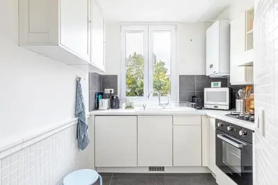 Cuisine ou kitchenette dans l'établissement GuestReady - Douceur Parisienne dans le 15e arr.