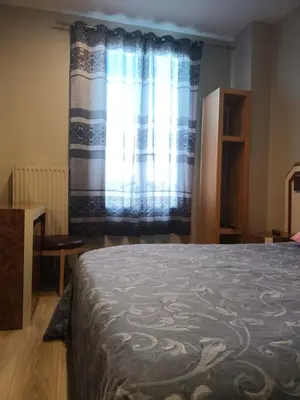 Un ou plusieurs lits dans un hébergement de l'établissement hotel azur