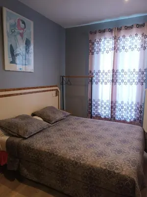 Un ou plusieurs lits dans un hébergement de l'établissement hotel azur