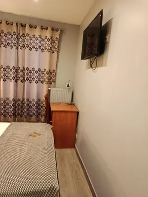 Télévision ou salle de divertissement dans l'établissement hotel azur