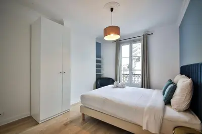 Un ou plusieurs lits dans un hébergement de l'établissement 3D#Appart 6Pers#2 Chambres#Commerce#Paris 15#AC