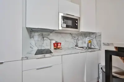 Cuisine ou kitchenette dans l'établissement 0#Appart 4Pers#1 Bedroom#Paris 15#Commerce#AC