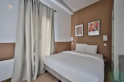 Un ou plusieurs lits dans un hébergement de l'établissement 0#Appart 4Pers#1 Bedroom#Paris 15#Commerce#AC