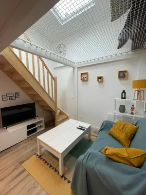 Télévision ou salle de divertissement dans l'établissement Center PARIS