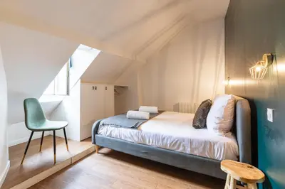 Un ou plusieurs lits dans un hébergement de l'établissement SENTIER, MARAIS, spacieux duplex 2 salles de bain