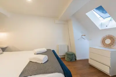 Un ou plusieurs lits dans un hébergement de l'établissement SENTIER, MARAIS, spacieux duplex 2 salles de bain