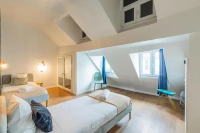 Un ou plusieurs lits dans un hébergement de l'établissement SENTIER, MARAIS, spacieux duplex 2 salles de bain