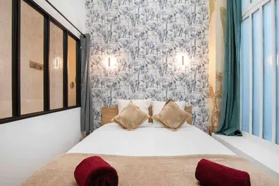 Un ou plusieurs lits dans un hébergement de l'établissement MONTMARTRE, Gare de l'EST, suite 1 chambre 2 à 4P