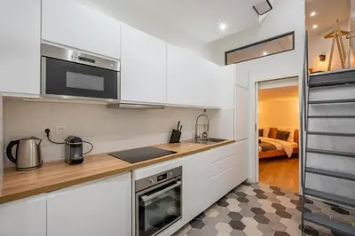 Cuisine ou kitchenette dans l'établissement NOTRE DAME, ODÉON 5e, Triplex 2 salles de bain