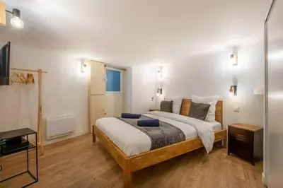 Un ou plusieurs lits dans un hébergement de l'établissement NOTRE DAME, ODÉON 5e, Triplex 2 salles de bain