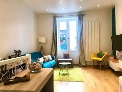 Coin salon dans l'établissement Adorable souplex batignolles