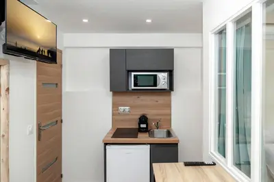 Cuisine ou kitchenette dans l'établissement Nets Inn Apartment - Gare de Lyon
