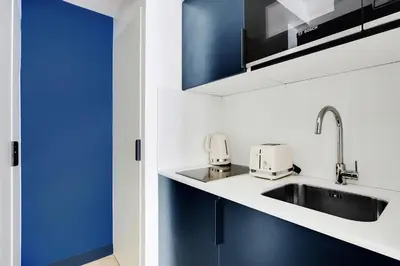Cuisine ou kitchenette dans l'établissement Sereners - Bastille