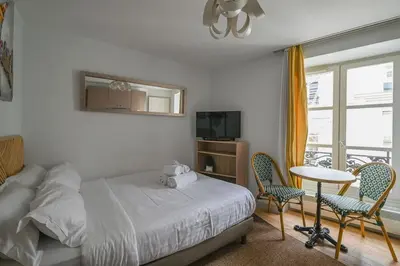 Un ou plusieurs lits dans un hébergement de l'établissement Paris, Opéra 4D...en plein coeur de la Paris