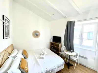 Un ou plusieurs lits dans un hébergement de l'établissement Magnifique appartement à Opéra (Opéra6D)