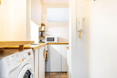 Cuisine ou kitchenette dans l'établissement GuestReady - Charme et Confort dans le 11ᵉ arr.