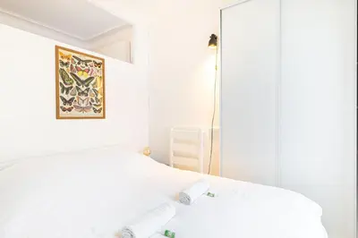 Un ou plusieurs lits dans un hébergement de l'établissement GuestReady - Charme et Confort dans le 11ᵉ arr.