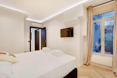 Un ou plusieurs lits dans un hébergement de l'établissement Elegant apartment - 2BR-6P - Le Marais