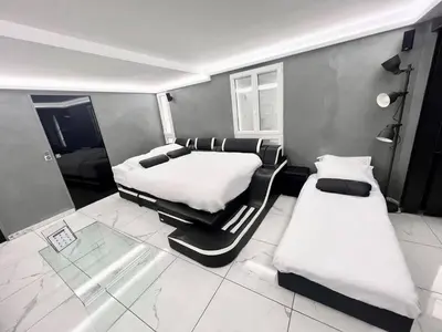 Un ou plusieurs lits dans un hébergement de l'établissement Modern Loft in Paris Center!