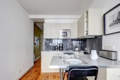 Cuisine ou kitchenette dans l'établissement 310 Suite Petit Nid Douillet Apartment in Paris