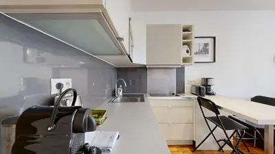 Cuisine ou kitchenette dans l'établissement 310 Suite Petit Nid Douillet Apartment in Paris