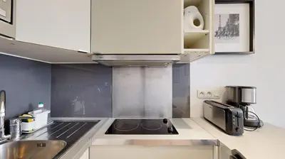 Cuisine ou kitchenette dans l'établissement 310 Suite Petit Nid Douillet Apartment in Paris