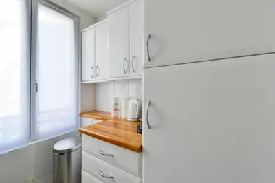 Cuisine ou kitchenette dans l'établissement Cosy Cocon - Proche Tour Eiffel - by Mon Petit Faré