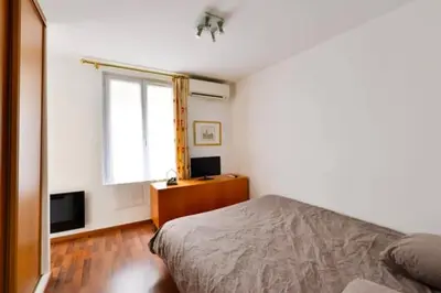 Un ou plusieurs lits dans un hébergement de l'établissement Cosy Cocon - Proche Tour Eiffel - by Mon Petit Faré