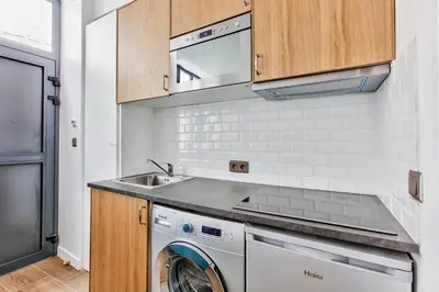 Cuisine ou kitchenette dans l'établissement Suite Montorgueil