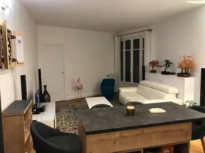 Coin salon dans l'établissement Cosy Appartement in Paris 15th - Convention Center