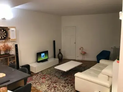Télévision ou salle de divertissement dans l'établissement Cosy Appartement in Paris 15th - Convention Center