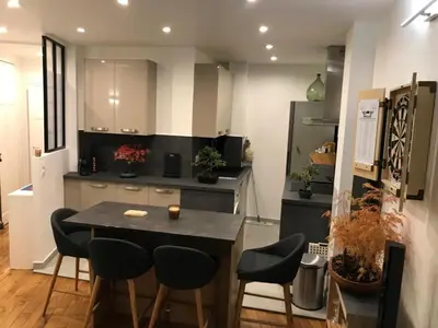 Cuisine ou kitchenette dans l'établissement Cosy Appartement in Paris 15th - Convention Center
