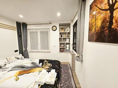 Un ou plusieurs lits dans un hébergement de l'établissement Your cozy cove by Paris