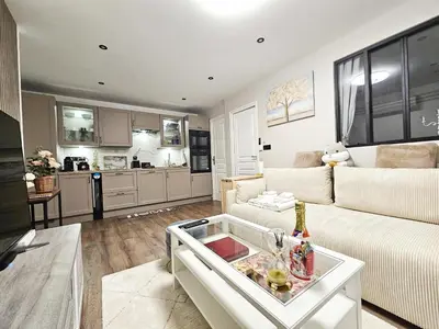 Cuisine ou kitchenette dans l'établissement Your cozy cove by Paris